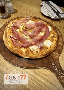 Tyrolean style pizza with regional ingredients